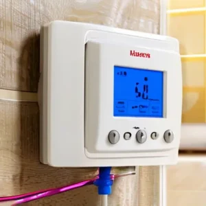 Как выбрать терморегулятор для теплого пола: механический vs программируемый